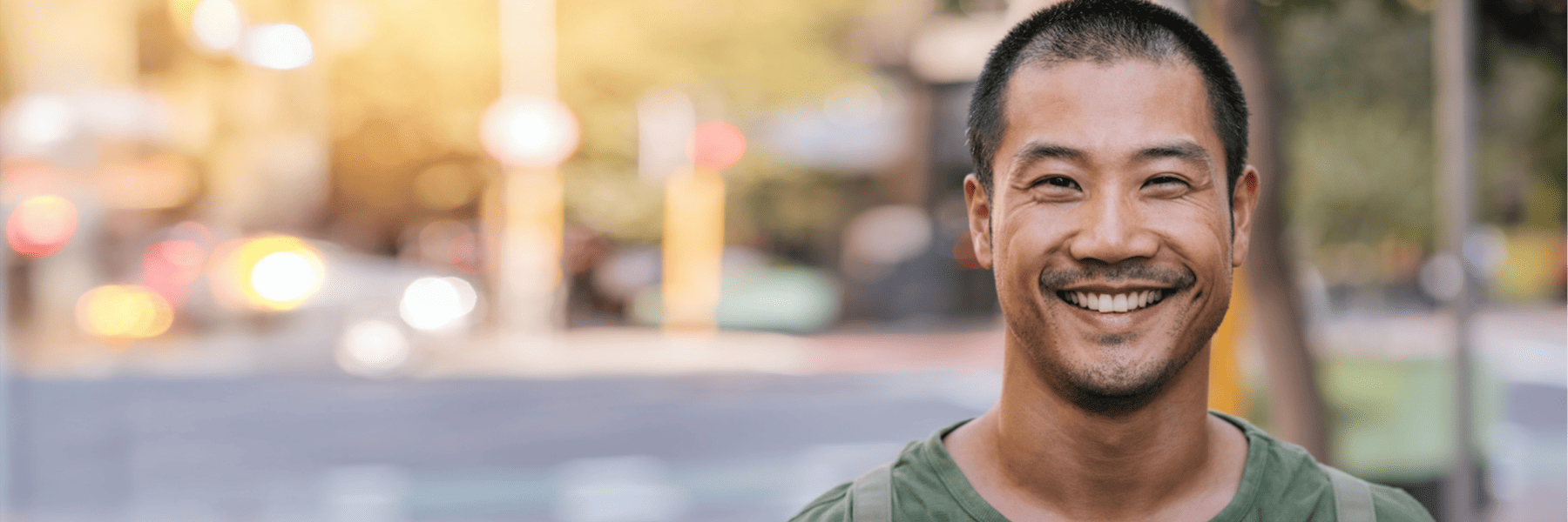 Smiling man outdoors in the morning, representing early dental appointments in Glendale, CA