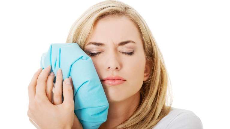 Lady Suffering Toothache