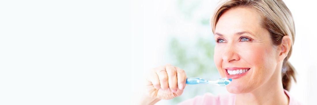woman brushing teeth | Glendale CA Dentist